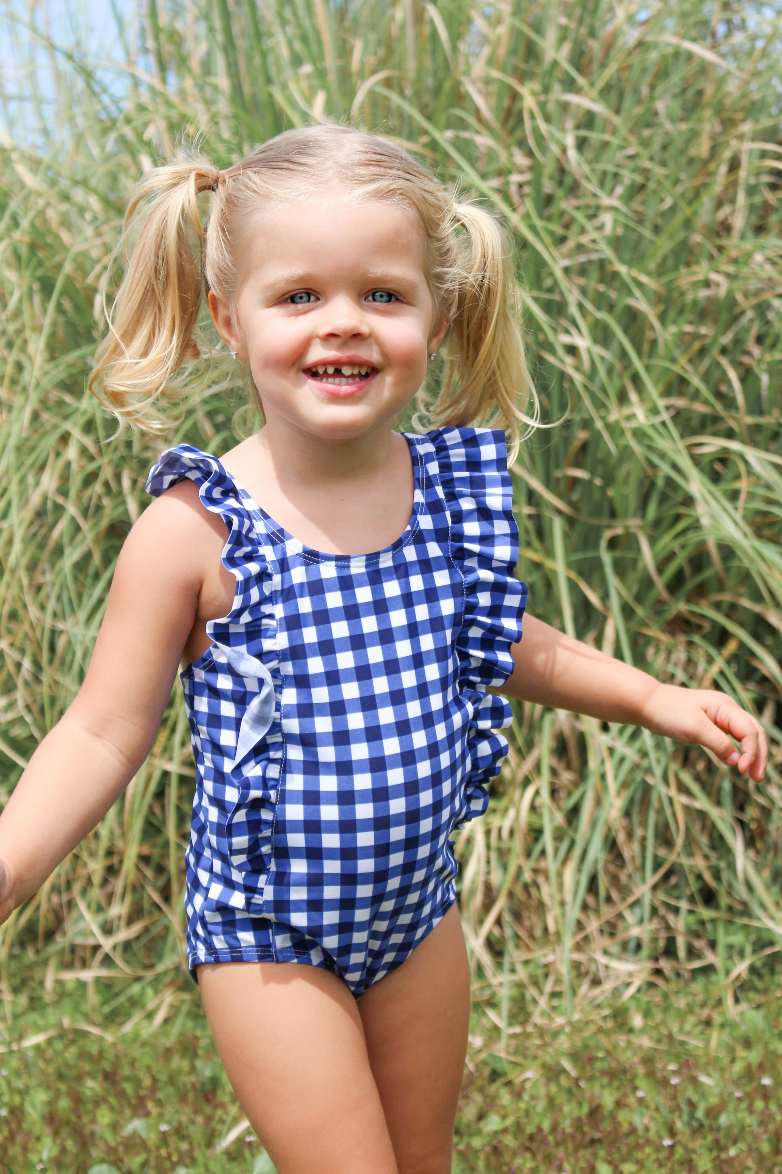 Girls Ruffle One-Piece Swimsuit | "Too Sweet" Navy Gingham-SwimZip UPF 50+ Sun Protective Swimwear & UV Zipper Rash Guards-pos9