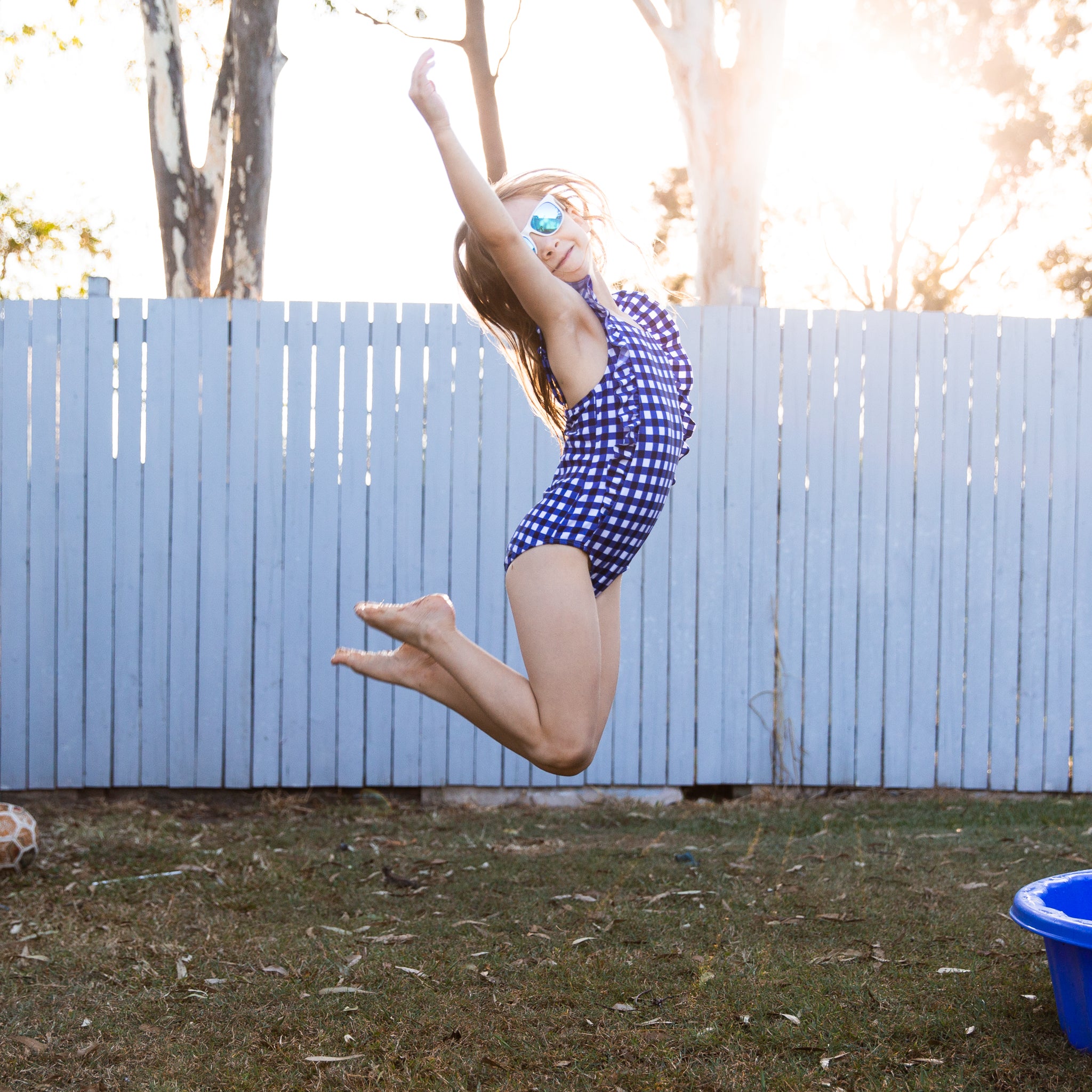 Girls Ruffle One-Piece Swimsuit | "Too Sweet" Navy Gingham-SwimZip UPF 50+ Sun Protective Swimwear & UV Zipper Rash Guards-pos3